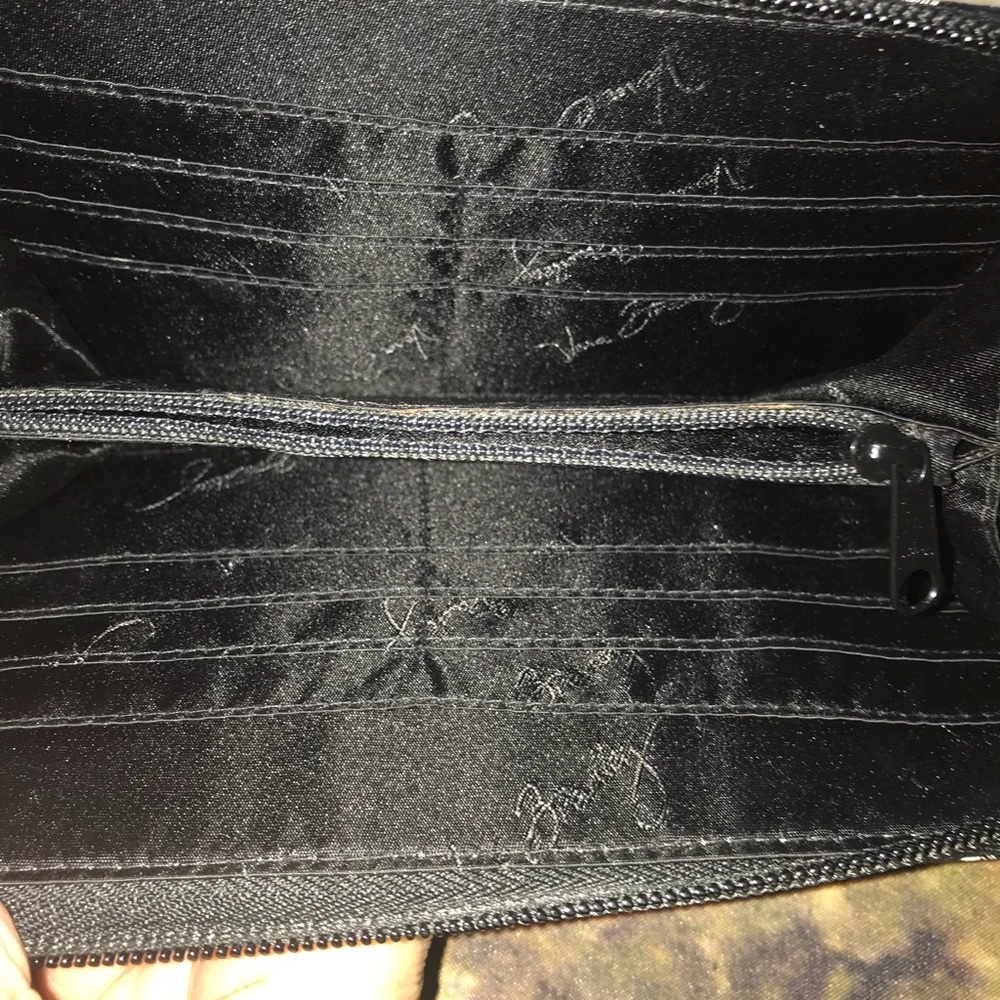 Vera Bradley zip around wallet.